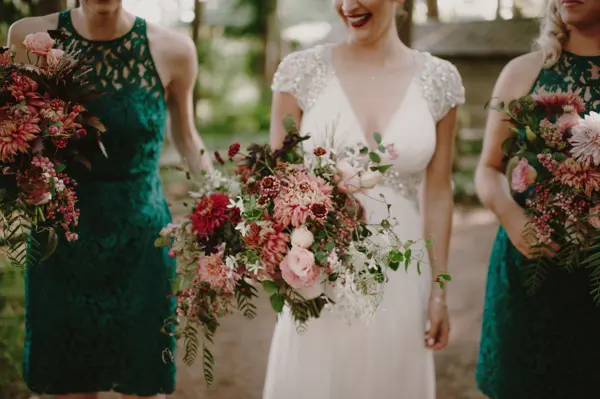 Bride and bridesmaids with floral bouquets at outdoor Seattle-area wedding. Lovely Events.